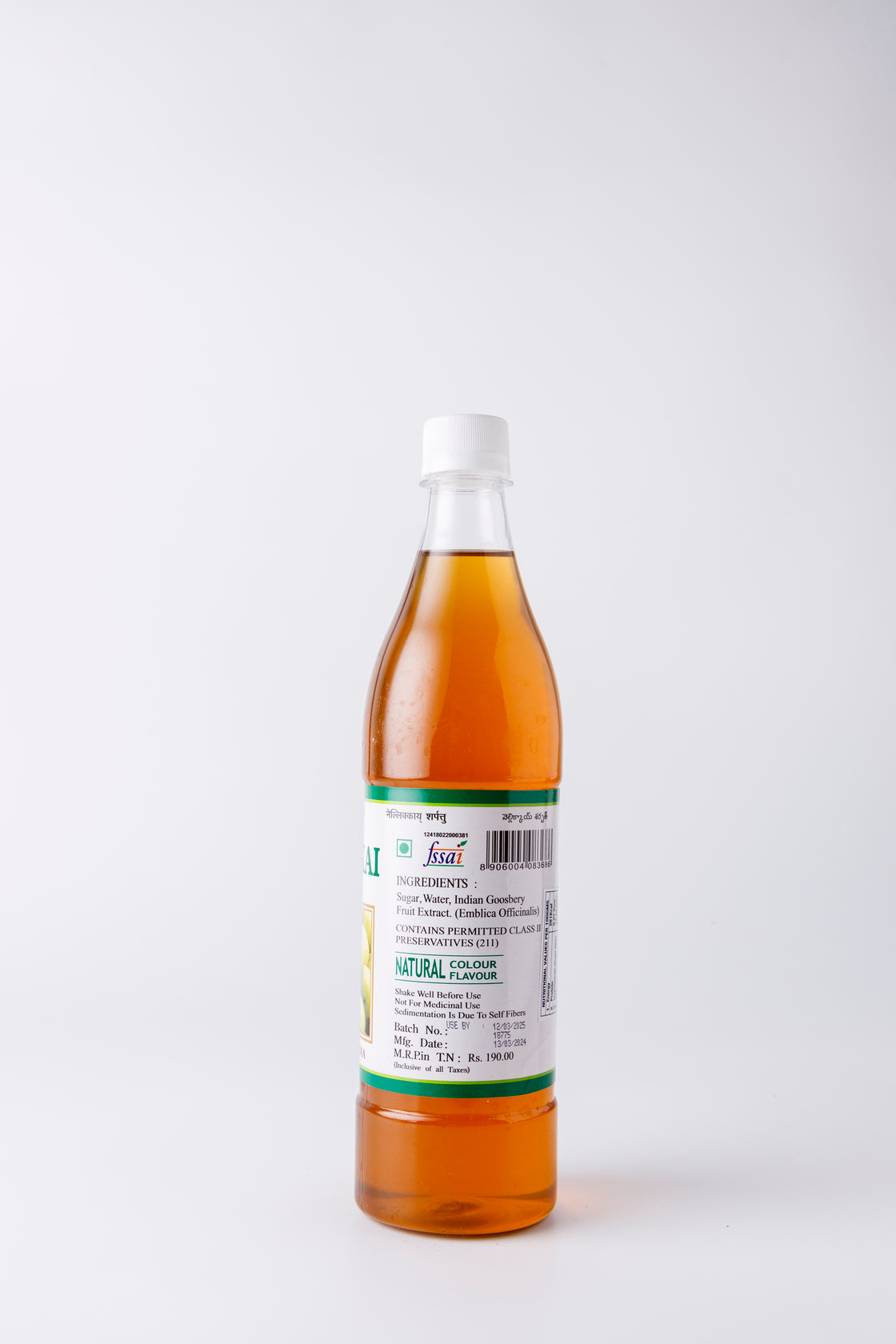 Pouring Amla Sarpath into a Glass